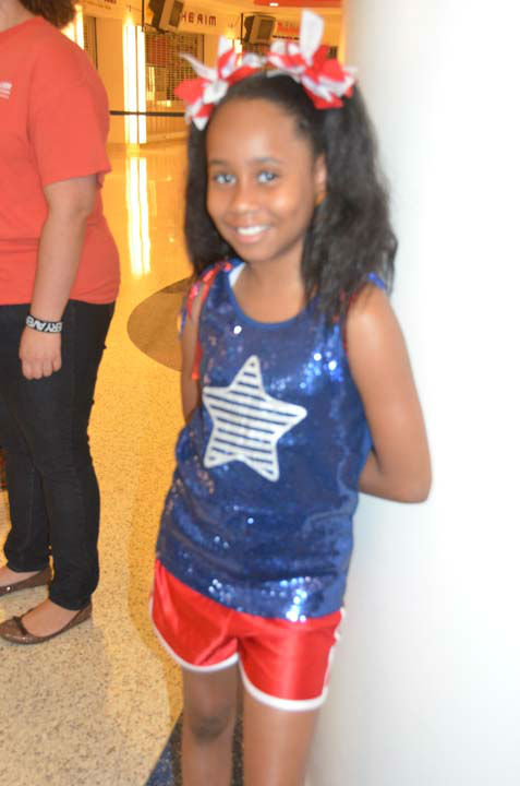 Two young dancers are lined up to audition for...